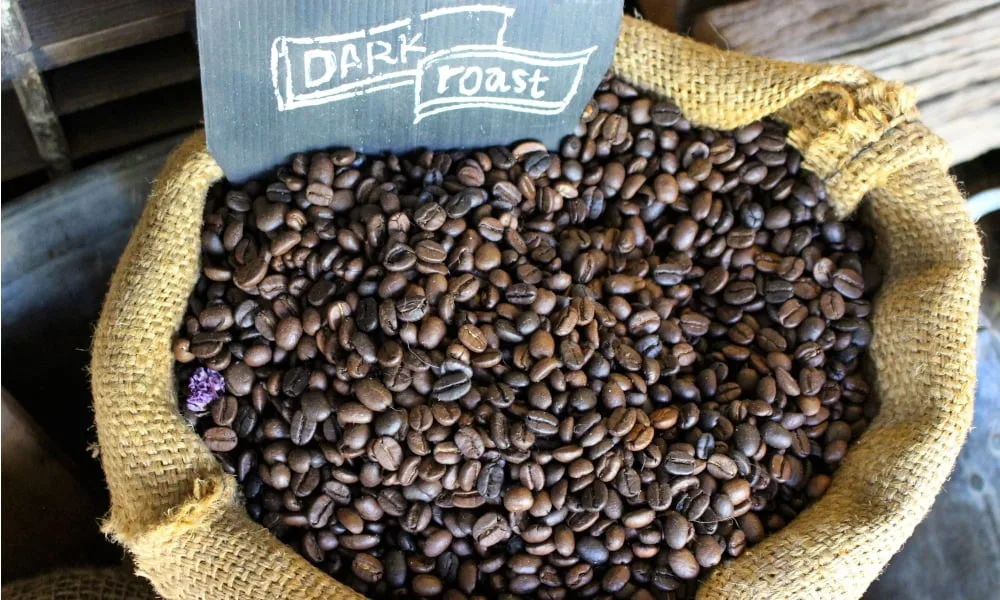 A bag full of French roast coffee beans